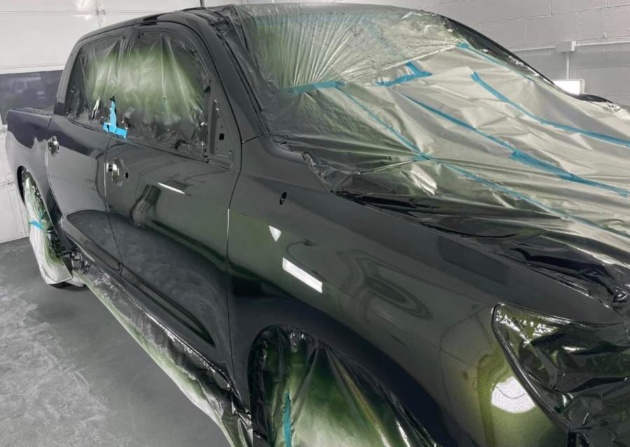 Completed Paint work on the right side of a pickup truck