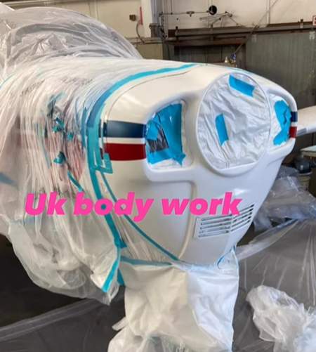 Airplane Paint Job Completed with Red and Blue Stipes